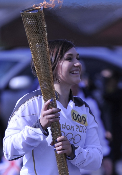 Sophie Chatel carrying the Olympic Torch